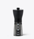 Black and transparent coffee grinder with HARIO branding on a white background