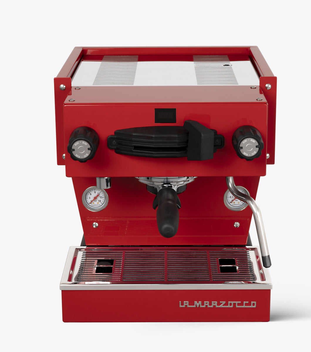 Red espresso machine with 'La Marzocco' branding on a white background