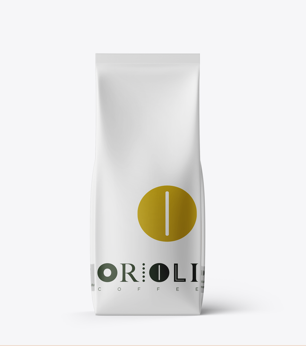 White coffee bag with a yellow logo and 'Horolia Coffee' text on a white background